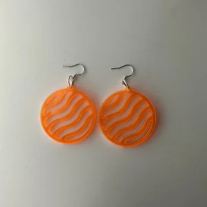 round wavy orange earrings