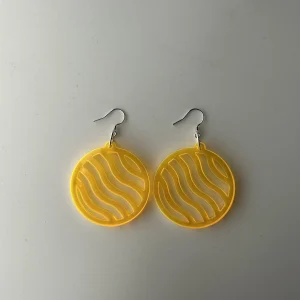 round wavy yellow earrings