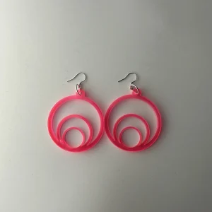 Round designer red earrings