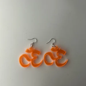 Om orange earrings