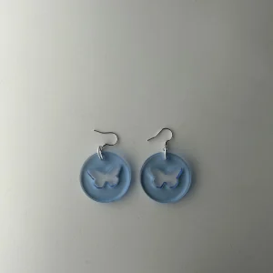 Round butterfly blue earrings
