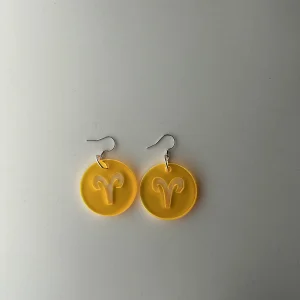 capricon yellow earrings